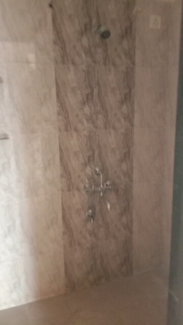 Bathroom in 1 BHK Apartment at Taras Heights, Kiwale – for Rent