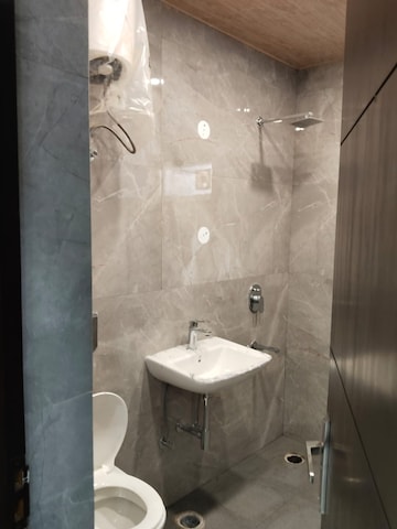 Bathroom in 4 BHK Apartment at Vasant Kunj – for Sale