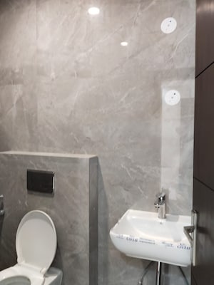 Bathroom in 4 BHK Apartment at Vasant Kunj – for Sale