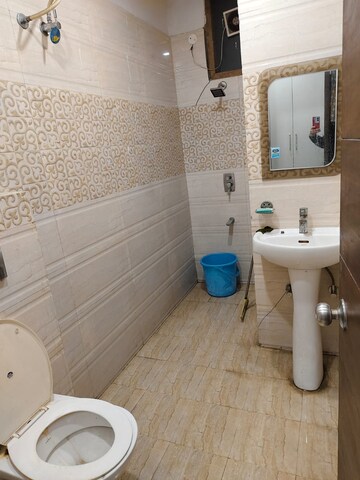 Bathroom in 3 BHK Builder Floor at MP Metro Towers, Dhakoli Village – for Rent