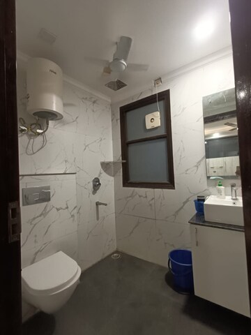 Bathroom in 4 BHK Apartment at Shri Sai Kripa Rainbow Apartments, Sector 43 – for Rent
