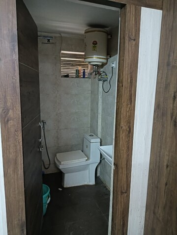 Bathroom in 1 RK Apartment at Emaar Emerald Floors Premier, Sector 65 – for Rent