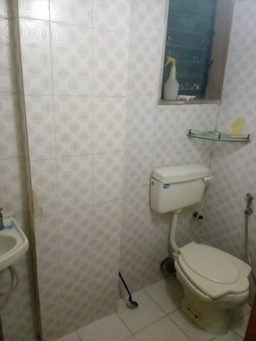 Bathroom in 1 BHK Apartment at Shree Sai Prasad CHS Ltd, Goregaon West – for Rent