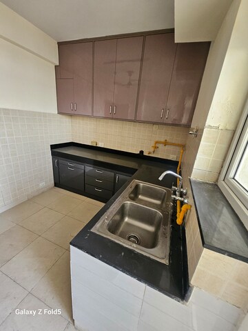 Kitchen in 3 BHK Apartment at Mahindra Lifespaces Chloris, Sector 19 – for Rent