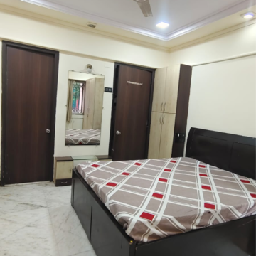 Bedroom in 2 BHK Apartment at Niwara CHS Andheri West, Sv Patel Nagar – for Rent