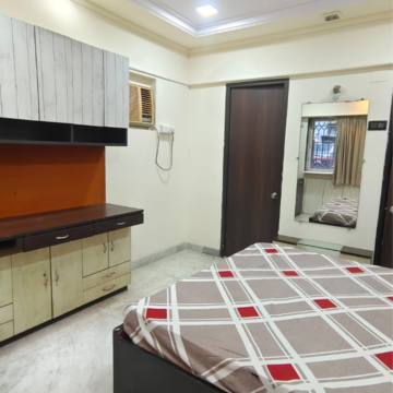 Bedroom in 2 BHK Apartment at Niwara CHS Andheri West, Sv Patel Nagar – for Rent