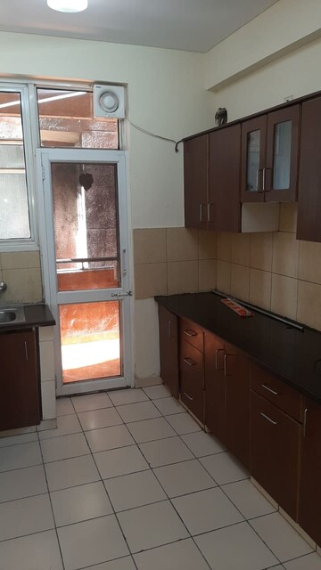 Kitchen in 4 BHK Apartment at Omaxe The Nile, Sector 49 – for Sale