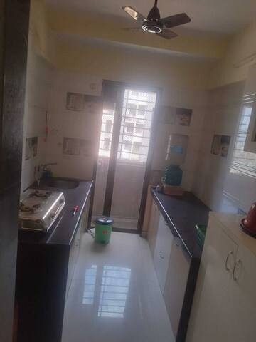 Kitchen in 2 BHK Apartment at Sri Dutt Garden Avenue K, Virar West – for Rent