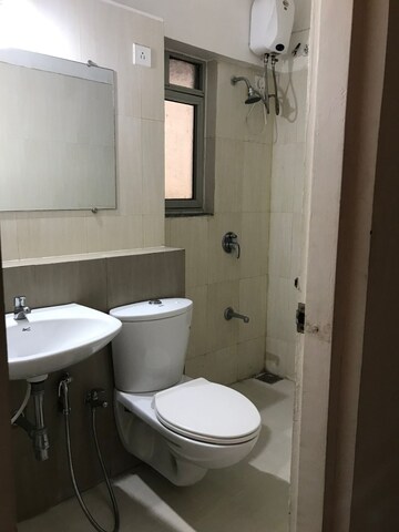 Bathroom in 2 BHK Apartment at Adani Elysium, Near Vaishno Devi Circle On Sg Highway – for Rent