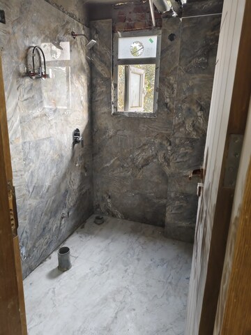 Bathroom in 2 BHK Apartment at Buildlopers Hi Tech Homes, Sector 104 – for Sale