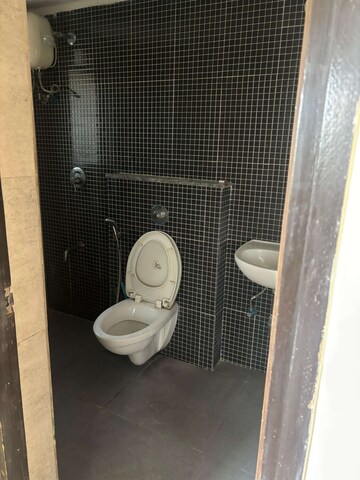 Bathroom in 1.5 BHK Apartment at Lodha Palava Downtown, Dombivli East – for Rent