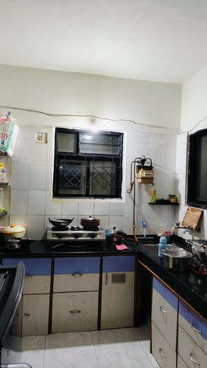 Kitchen in 2 BHK Apartment at Kumar Paradise Pune, Magarpatta City – for Sale