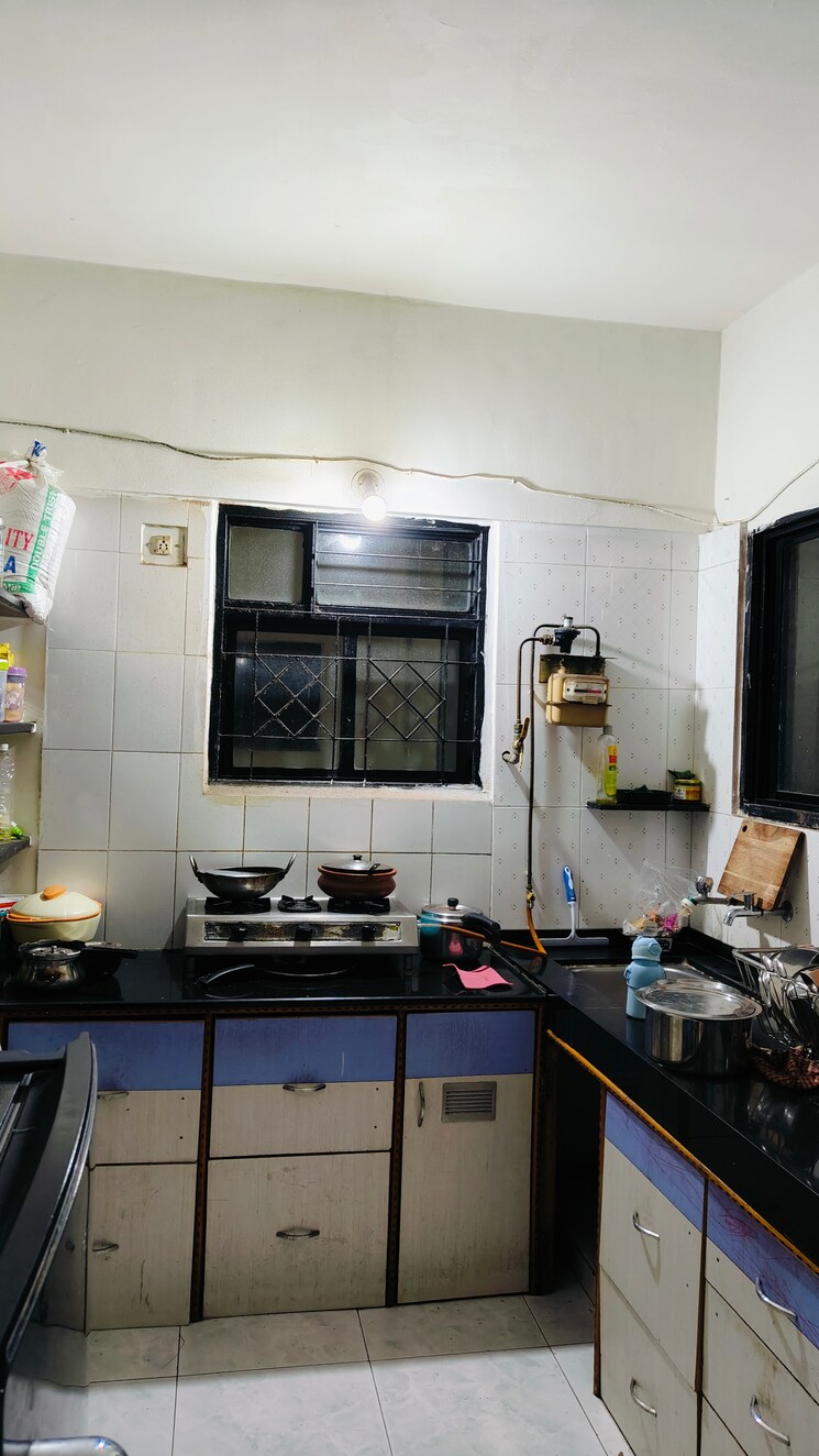 Kitchen, kumar-paradise-pune 2 Bedroom 813 Sq.Ft. Apartment In Magarpatta City Pune 8426367