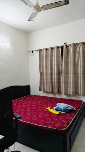 Bedroom in 2 BHK Apartment at Kumar Paradise Pune, Magarpatta City – for Sale