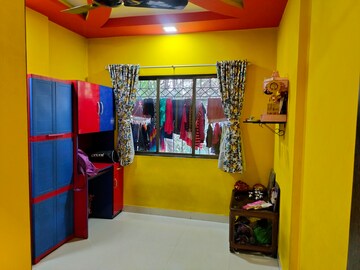 Bedroom in 2 BHK Apartment at Nisarg Upvan, Patlipada – for Rent
