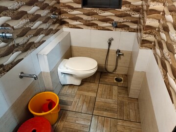 Bathroom in 2 BHK Apartment at Nisarg Upvan, Patlipada – for Rent