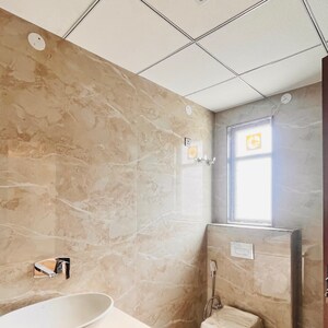 Bathroom in 3 BHK Builder Floor at Ansal API Esencia, Sector 67 – for Sale