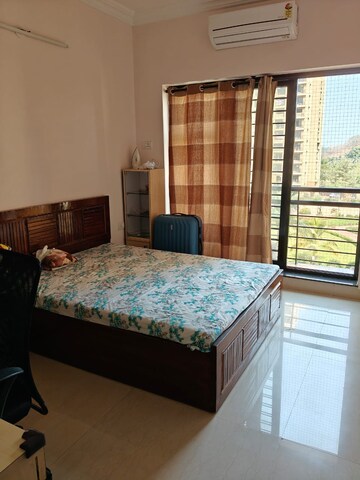 Bedroom in 2 BHK Apartment at K Raheja Heights, Malad East – for Rent