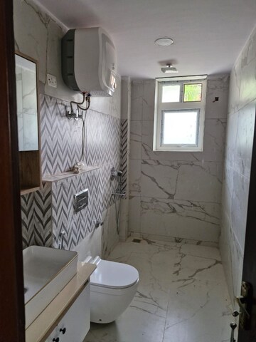 Bathroom in 4 BHK Builder Floor at Malviya Nagar – for Rent