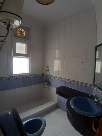Bathroom in 1.5 BHK Builder Floor at Kalkaji – for Rent