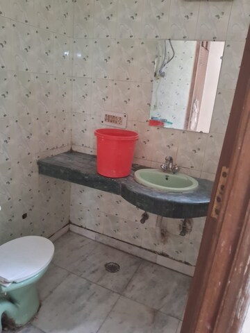 Bathroom in 1.5 BHK Builder Floor at Kalkaji – for Rent