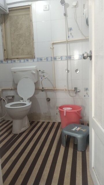 Bathroom in 3 BHK Apartment at Royal Palms, Goregaon East – for Rent