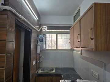 Kitchen in 1 RK Apartment at Ansal Sushant Estate, Sector 52 – for Rent