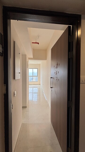 Building Lobby in 3 BHK Apartment at Piramal Vaikunth, Balkum Pada – for Rent