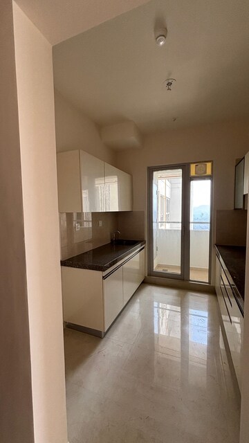 Kitchen in 3 BHK Apartment at Piramal Vaikunth, Balkum Pada – for Rent