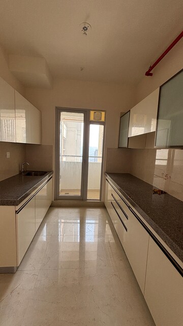 Kitchen in 3 BHK Apartment at Piramal Vaikunth, Balkum Pada – for Rent
