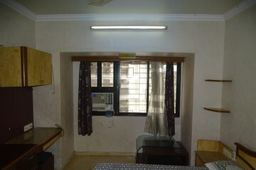 Living Room in 2 BHK Apartment at Dheeraj Gaurav Heights, Jogeshwari West – for Sale