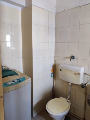 Bathroom in 1 RK Apartment at Royal Palms Garden View, Goregaon East – for Rent