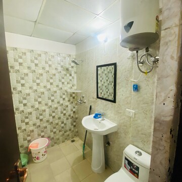 Bathroom in 2 BHK Apartment at Antriksh Golf View, Sector 78 – for Rent