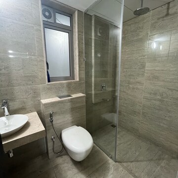 Bathroom in 3 BHK Apartment at Oberoi Sky City, Khande Rao Dongari – for Rent
