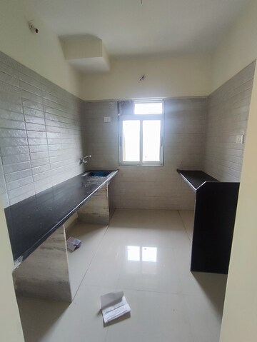 Kitchen in 1 BHK Apartment at Kishor Sukur Enclave A, Ghodbunder Road – for Sale