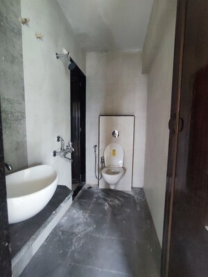 Bathroom in 1 BHK Apartment at Kishor Sukur Enclave A, Ghodbunder Road – for Sale
