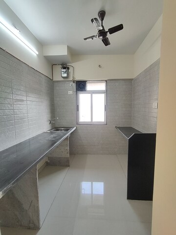Kitchen in 1 BHK Apartment at Kishor Sukur Enclave A, Ghodbunder Road – for Rent