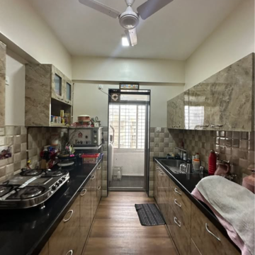 Kitchen in 2 BHK Apartment at Raheja Solitaire, Udyog Nagar – for Rent