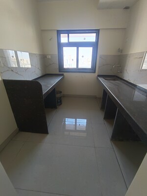 Kitchen in 2 BHK Apartment at Siddhi Highland Park Phase 2, Kapur Bawdi – for Sale