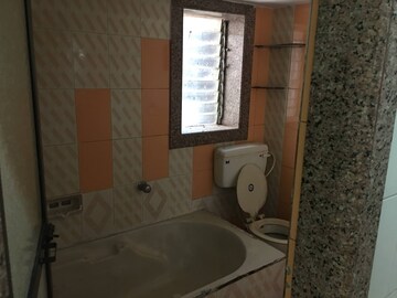 Bathroom in 2 BHK Apartment at New Gokul Plaza CHS, Kandivali East – for Rent