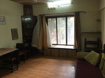 Living Room in 2 BHK Apartment at New Gokul Plaza CHS, Kandivali East – for Rent
