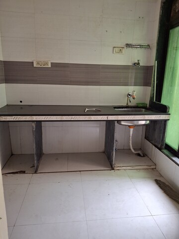 Kitchen in 1 BHK Apartment at Sai Ashish CHS, Ghansoli – for Rent