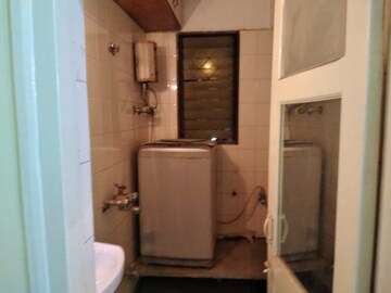 Bathroom in 3 BHK Apartment at Amber Park CHSL, Andheri West – for Rent