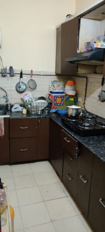 Kitchen in 1 BHK Apartment at Nilaya Greens, Raj Nagar Extension – for Sale
