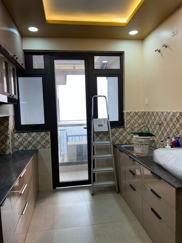 Kitchen in 3 BHK Apartment at Bengal Peerless Avidipta, Em Bypass – for Rent