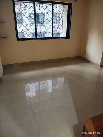 Room in 2 BHK Apartment at Satellite Garden, Goregaon East – for Sale