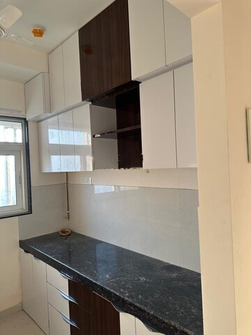 Kitchen in 2 BHK Apartment at Ashar Axis, Majiwada – for Rent