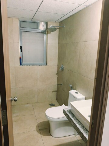 Bathroom in 2 BHK Apartment at Kalpataru Immensa, Kolshet Road – for Rent