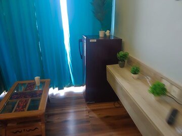 Living Room in Studio Apartment at Gaur City Mall, Sector 4, Greater Noida – for Rent