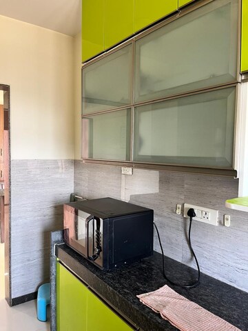 Kitchen in 2 BHK Apartment at Acme Ozone, Manpada – for Rent
